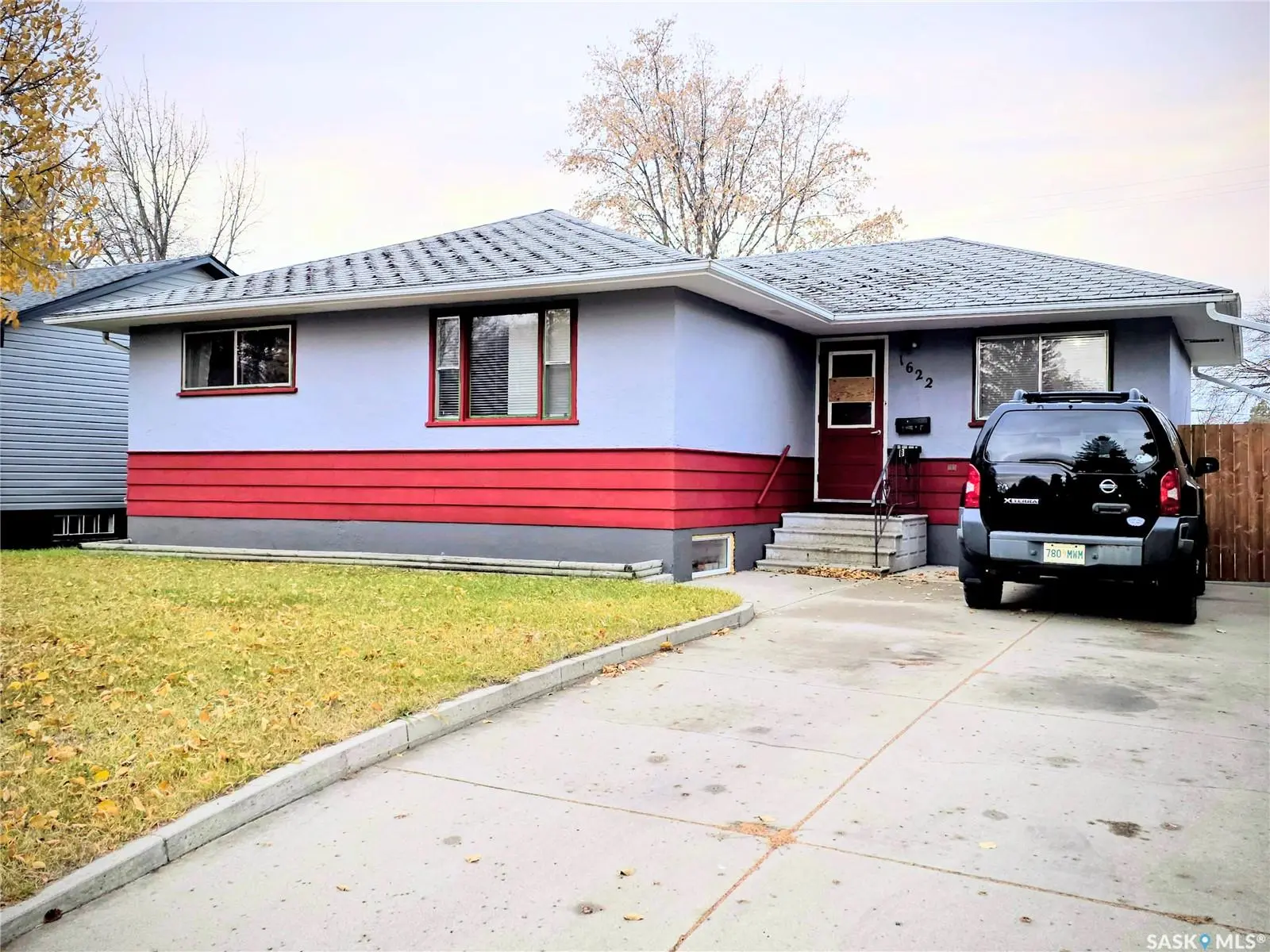 Exterior photo of 1622 Cumberland Avenue S, Saskatoon SK — bungalow with legal basement suite in Holliston.